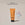 A yellow tube of ACURE Seriously Soothing SPF Day Cream with SPF 30 protection on a neutral bcakground with a circle displaying the old packaging and a text calling out: NEw look, same proven formula
